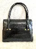 hermès sac loto en cuir noir vintage