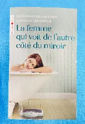 livre la femme qui voit de l'autre côté du miroir