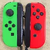 paire joycon vert et rouge