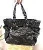 sac cabas chanel grand shopping en toile matelassée noire et cuir noir