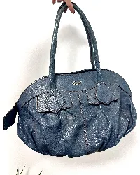 sac lancel à gousset en cuir souple bleu canard à surpiqures marron