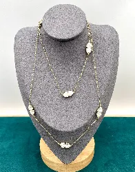 swarovski sautoir/collier en cristaux et métal doré