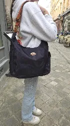 sac longchamp besace pliage mauve