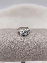 bague argent bombée sertie de pierre bleu et oxydes blancs argent 925 millième (22 ct) 3,08gr