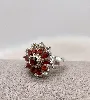 bague argent marguerit sertie des strass et pierres rouges argent 925 millième (22 ct) 6,9g