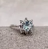 bague argent marguerite sertie de pierre bleue et entouré d'oxydes argent 925 millième (22 ct) 1,59g