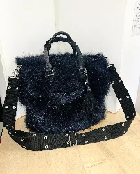 sac sacal en cuir et fourrure synthétique bleu marine