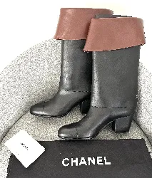 bottes chanel cavalière en cuir noir et marron