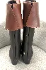 bottes chanel cavalière en cuir noir et marron