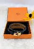 hermès bracelet mini kelly double tour en cuir noir et fermoir en métal doré