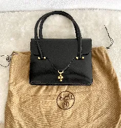 hermès sac loto en cuir noir vintage