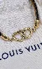 louis vuitton bracelet say yes en toile monogram et cuir centré deux coeurs entrelacés en métal doré