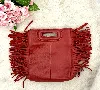 mini sac m de maje en cuir rouge à franges avec deux bandoulière dont une neuve