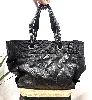 sac cabas chanel grand shopping en toile matelassée noire et cuir noir