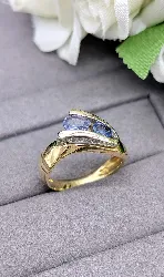 bague vague sertie de 2 saphirs et 2 lignes de diamants sertis aux côtés or 750 millième (18 ct) 5,68g