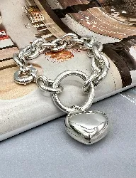 bracelet en argent à mailons avec pendentif coeur  argent 925 millième (22 ct) 38,17 g