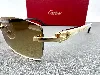 cartier lunettes de soleil signature c ct0064s 0010 branches en corne d'eau de buffle