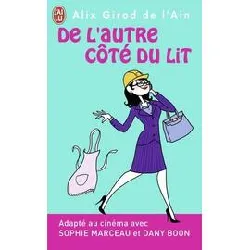 livre de l'autre côté du lit