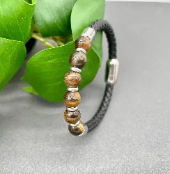 bracelet en cuir noir tressé et oeil de tigre avec acier argenté 5mm l21cm